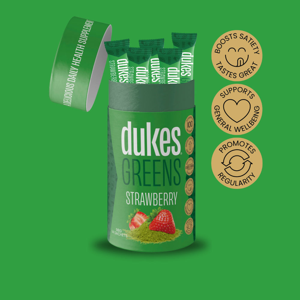Tube of Dukes Greens Strawberry Flavour showing sachets. Badges on the side reading: Boosts Satiety, Supports General Wellbeing, Promotes Regularity.