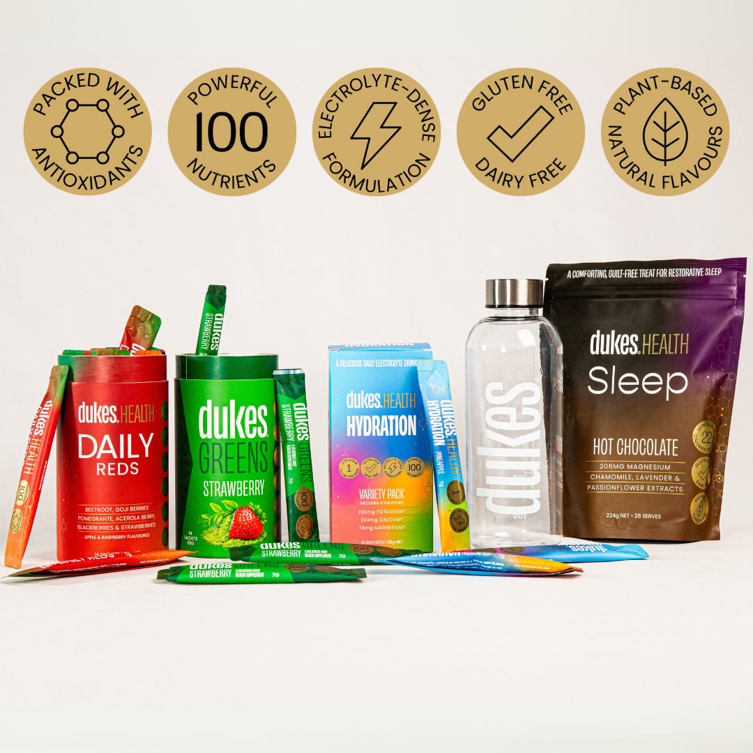 Health starter pack contents side by side, including: Daily Reds, Greens Strawberry Flavour, Hydration Variety Pack, Hydration Bottle and Sleep Hot Chocolate. Badges above state: Packed with ingredients, 100 Powerful ingredients, electrolyte-dense formulation, gluten and dairy free, Plant- based natural flavours.
